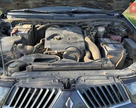 Серый Мицубиси Л 200, объемом двигателя 2.48 л и пробегом 234 тыс. км за 13000 $, фото 38 на Automoto.ua