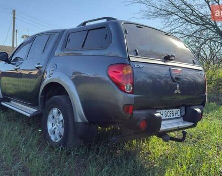 Серый Мицубиси Л 200, объемом двигателя 2.48 л и пробегом 234 тыс. км за 13000 $, фото 18 на Automoto.ua