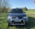Серый Мицубиси Л 200, объемом двигателя 2.48 л и пробегом 234 тыс. км за 13000 $, фото 2 на Automoto.ua