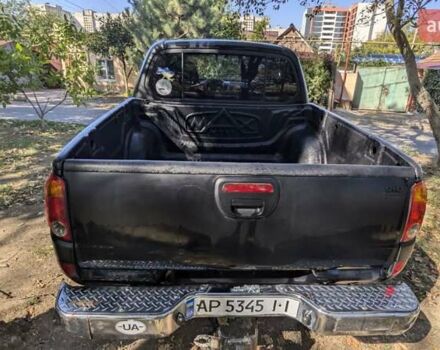 Серый Мицубиси Л 200, объемом двигателя 2.48 л и пробегом 291 тыс. км за 11999 $, фото 16 на Automoto.ua