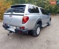 Сірий Міцубісі Л 200, об'ємом двигуна 2.48 л та пробігом 390 тис. км за 10900 $, фото 6 на Automoto.ua
