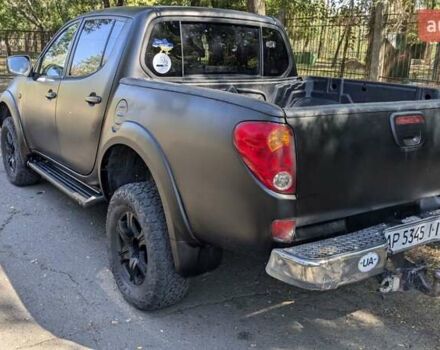 Серый Мицубиси Л 200, объемом двигателя 2.48 л и пробегом 291 тыс. км за 11999 $, фото 4 на Automoto.ua