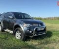 Серый Мицубиси Л 200, объемом двигателя 2.48 л и пробегом 234 тыс. км за 13000 $, фото 1 на Automoto.ua