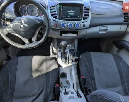 Серый Мицубиси Л 200, объемом двигателя 2.48 л и пробегом 291 тыс. км за 11999 $, фото 12 на Automoto.ua