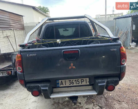 Серый Мицубиси Л 200, объемом двигателя 2.48 л и пробегом 252 тыс. км за 13700 $, фото 9 на Automoto.ua