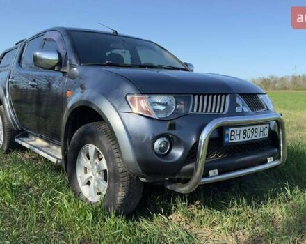 Серый Мицубиси Л 200, объемом двигателя 2.48 л и пробегом 234 тыс. км за 13000 $, фото 24 на Automoto.ua