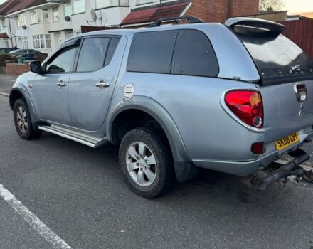 Серый Мицубиси Л 200, объемом двигателя 2.5 л и пробегом 116 тыс. км за 6384 $, фото 3 на Automoto.ua