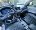Серый Мицубиси Л 200, объемом двигателя 2.5 л и пробегом 26 тыс. км за 12000 $, фото 7 на Automoto.ua