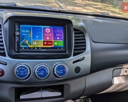 Серый Мицубиси Л 200, объемом двигателя 2.48 л и пробегом 291 тыс. км за 11999 $, фото 17 на Automoto.ua