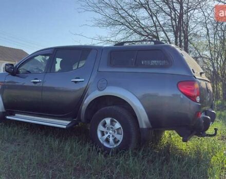 Серый Мицубиси Л 200, объемом двигателя 2.48 л и пробегом 234 тыс. км за 13000 $, фото 16 на Automoto.ua