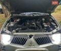 Серый Мицубиси Л 200, объемом двигателя 2.48 л и пробегом 265 тыс. км за 13000 $, фото 22 на Automoto.ua