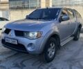 Серый Мицубиси Л 200, объемом двигателя 2.5 л и пробегом 230 тыс. км за 9700 $, фото 1 на Automoto.ua