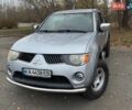 Серый Мицубиси Л 200, объемом двигателя 2.48 л и пробегом 336 тыс. км за 14000 $, фото 1 на Automoto.ua