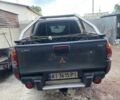 Серый Мицубиси Л 200, объемом двигателя 2.5 л и пробегом 26 тыс. км за 12000 $, фото 2 на Automoto.ua