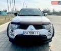 Серый Мицубиси Л 200, объемом двигателя 2.45 л и пробегом 205 тыс. км за 12500 $, фото 1 на Automoto.ua