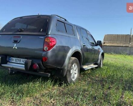 Серый Мицубиси Л 200, объемом двигателя 2.48 л и пробегом 234 тыс. км за 13000 $, фото 22 на Automoto.ua