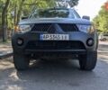 Серый Мицубиси Л 200, объемом двигателя 2.48 л и пробегом 291 тыс. км за 11999 $, фото 1 на Automoto.ua