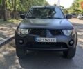 Серый Мицубиси Л 200, объемом двигателя 2.48 л и пробегом 291 тыс. км за 11999 $, фото 9 на Automoto.ua