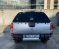 Серый Мицубиси Л 200, объемом двигателя 2.5 л и пробегом 230 тыс. км за 9700 $, фото 4 на Automoto.ua