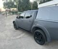 Серый Мицубиси Л 200, объемом двигателя 2.5 л и пробегом 220 тыс. км за 7850 $, фото 5 на Automoto.ua