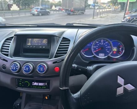 Серый Мицубиси Л 200, объемом двигателя 2.5 л и пробегом 220 тыс. км за 7850 $, фото 19 на Automoto.ua