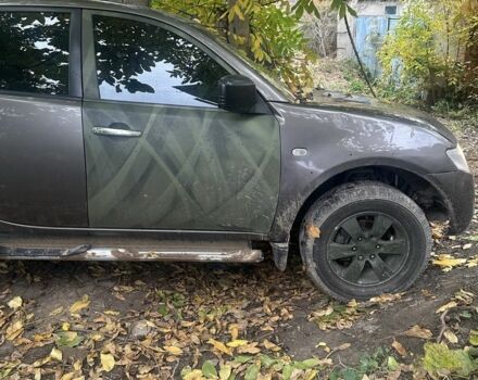 Серый Мицубиси Л 200, объемом двигателя 2.5 л и пробегом 200 тыс. км за 7850 $, фото 3 на Automoto.ua