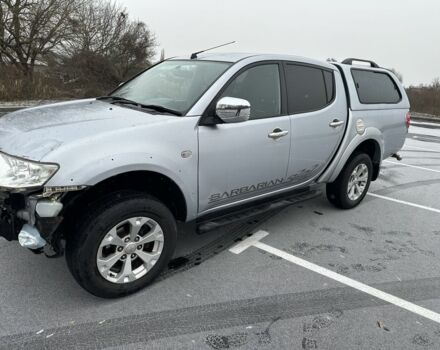 Серый Мицубиси Л 200, объемом двигателя 2.5 л и пробегом 155 тыс. км за 7888 $, фото 5 на Automoto.ua