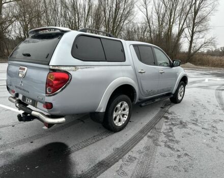 Серый Мицубиси Л 200, объемом двигателя 2.5 л и пробегом 155 тыс. км за 7888 $, фото 12 на Automoto.ua