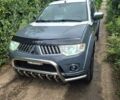 Серый Мицубиси Л 200, объемом двигателя 2.5 л и пробегом 247 тыс. км за 12000 $, фото 1 на Automoto.ua