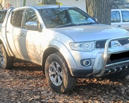 Серый Мицубиси Л 200, объемом двигателя 2.5 л и пробегом 306 тыс. км за 7500 $, фото 1 на Automoto.ua