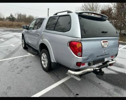 Серый Мицубиси Л 200, объемом двигателя 2.5 л и пробегом 155 тыс. км за 7888 $, фото 2 на Automoto.ua