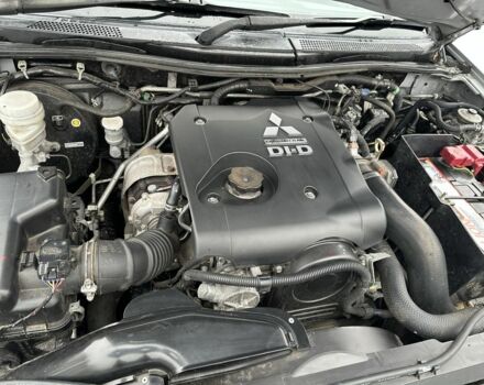 Серый Мицубиси Л 200, объемом двигателя 2.5 л и пробегом 155 тыс. км за 7888 $, фото 3 на Automoto.ua