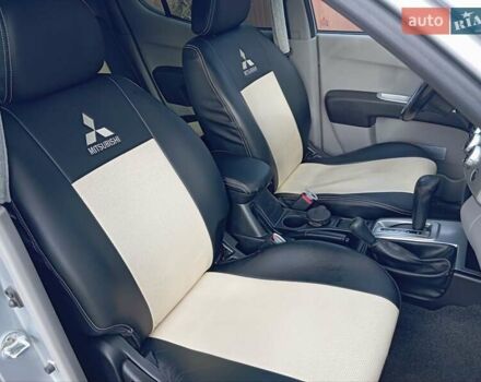 Сірий Міцубісі Л 200, об'ємом двигуна 2.48 л та пробігом 124 тис. км за 14200 $, фото 24 на Automoto.ua