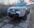 Серый Мицубиси Л 200, объемом двигателя 2.48 л и пробегом 224 тыс. км за 16500 $, фото 1 на Automoto.ua