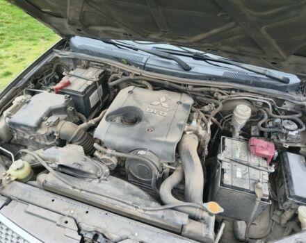 Серый Мицубиси Л 200, объемом двигателя 2.5 л и пробегом 251 тыс. км за 15500 $, фото 14 на Automoto.ua