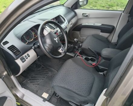 Серый Мицубиси Л 200, объемом двигателя 2.5 л и пробегом 251 тыс. км за 15500 $, фото 6 на Automoto.ua