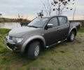 Серый Мицубиси Л 200, объемом двигателя 2.5 л и пробегом 251 тыс. км за 15500 $, фото 1 на Automoto.ua