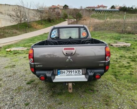 Серый Мицубиси Л 200, объемом двигателя 2.5 л и пробегом 251 тыс. км за 15500 $, фото 9 на Automoto.ua