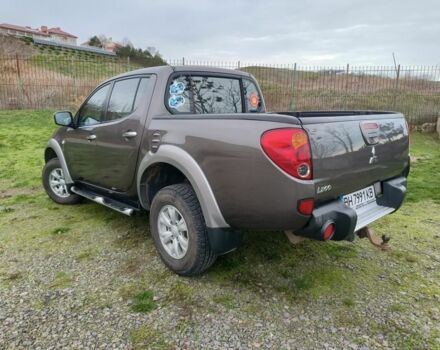 Серый Мицубиси Л 200, объемом двигателя 2.5 л и пробегом 251 тыс. км за 15500 $, фото 10 на Automoto.ua