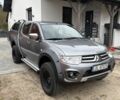 Серый Мицубиси Л 200, объемом двигателя 2.5 л и пробегом 147 тыс. км за 4900 $, фото 1 на Automoto.ua