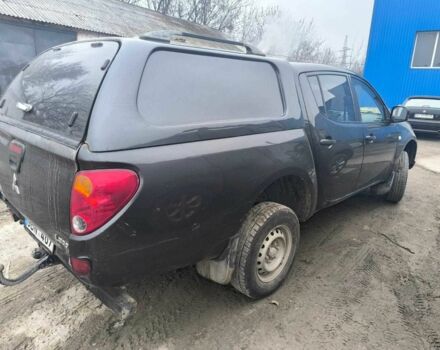 Серый Мицубиси Л 200, объемом двигателя 2.5 л и пробегом 250 тыс. км за 9209 $, фото 2 на Automoto.ua