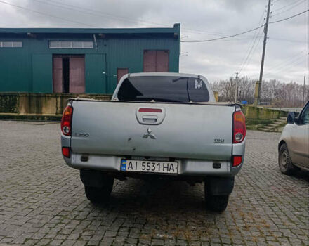 Серый Мицубиси Л 200, объемом двигателя 2.48 л и пробегом 299 тыс. км за 13900 $, фото 1 на Automoto.ua