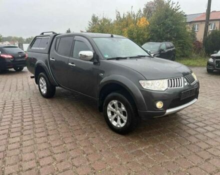 Серый Мицубиси Л 200, объемом двигателя 2.5 л и пробегом 230 тыс. км за 5000 $, фото 1 на Automoto.ua