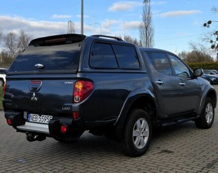 Серый Мицубиси Л 200, объемом двигателя 2.5 л и пробегом 130 тыс. км за 5222 $, фото 3 на Automoto.ua