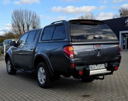 Серый Мицубиси Л 200, объемом двигателя 2.5 л и пробегом 130 тыс. км за 5222 $, фото 4 на Automoto.ua