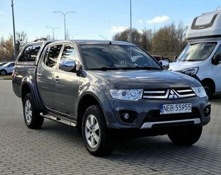 Серый Мицубиси Л 200, объемом двигателя 2.5 л и пробегом 130 тыс. км за 5222 $, фото 1 на Automoto.ua