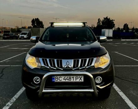 Серый Мицубиси Л 200, объемом двигателя 2.44 л и пробегом 160 тыс. км за 26000 $, фото 2 на Automoto.ua