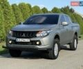 Серый Мицубиси Л 200, объемом двигателя 2.44 л и пробегом 160 тыс. км за 19999 $, фото 1 на Automoto.ua