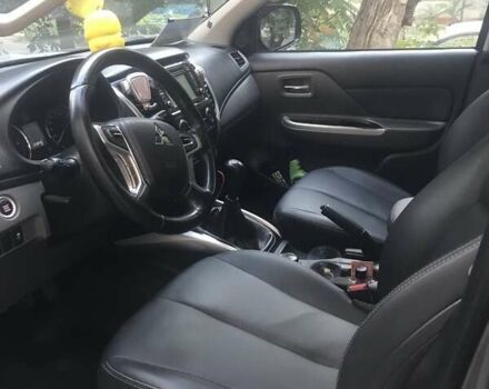 Серый Мицубиси Л 200, объемом двигателя 2.44 л и пробегом 149 тыс. км за 25000 $, фото 4 на Automoto.ua