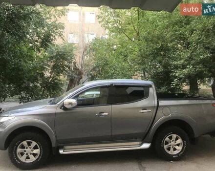 Серый Мицубиси Л 200, объемом двигателя 2.44 л и пробегом 149 тыс. км за 25000 $, фото 1 на Automoto.ua